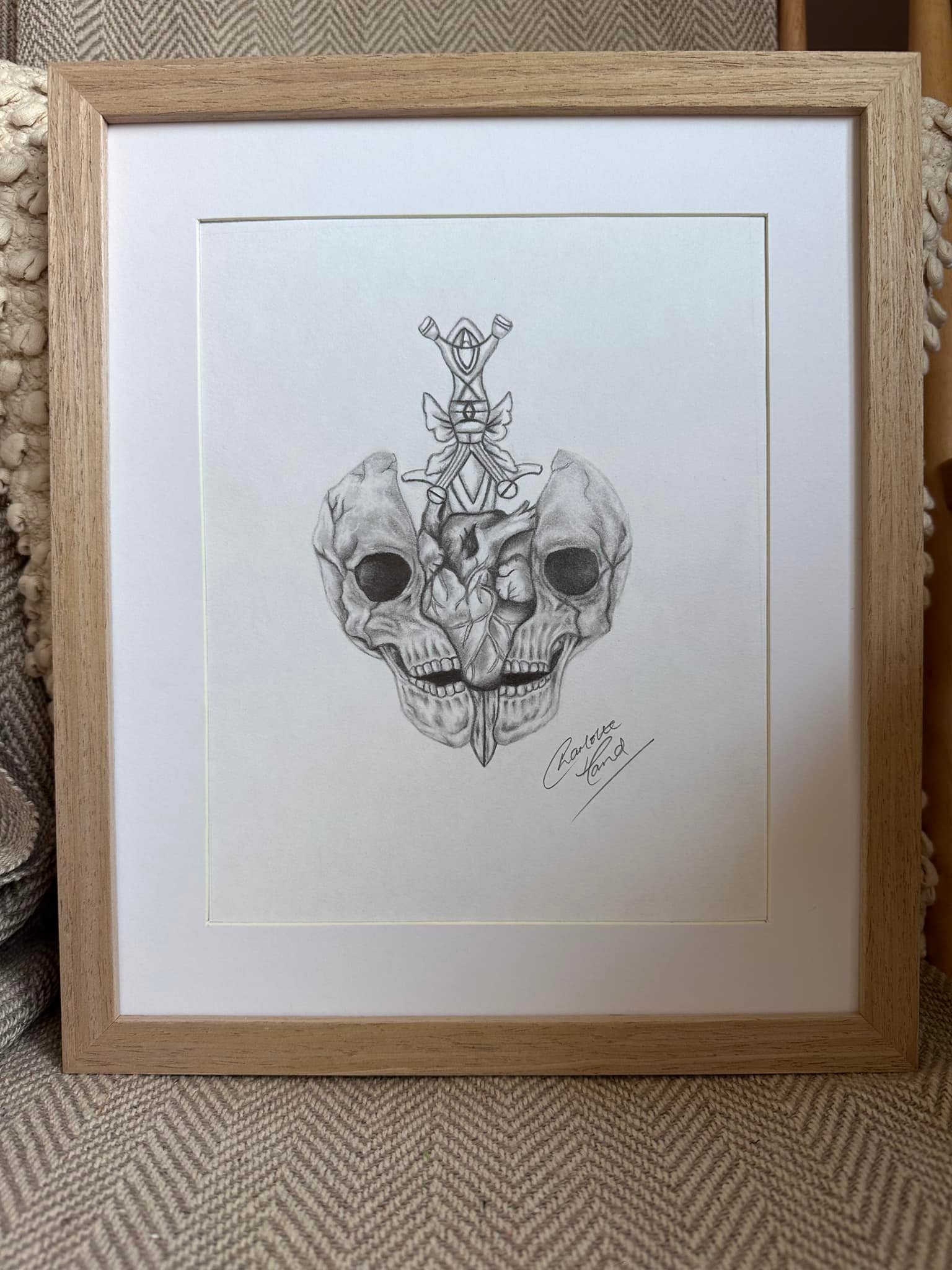 Skull with heart graphite drawing
